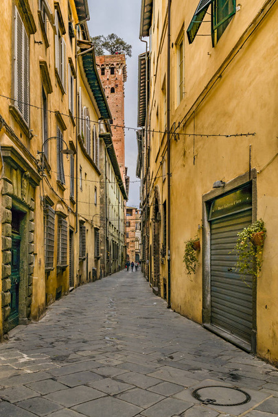 LUCCA, ITALY, JANUARY - 2018 - Urban street scene at historic center of lucca city, Tuscany, Italy - Photo, Image
