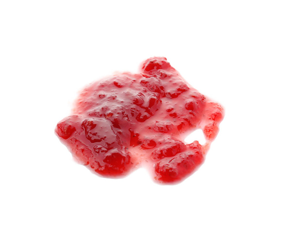 Mermelada de frambuesa dulce sobre fondo blanco - Foto, imagen