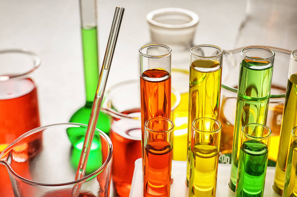 Test tubes with colorful samples in laboratory, closeup - Foto, Imagem