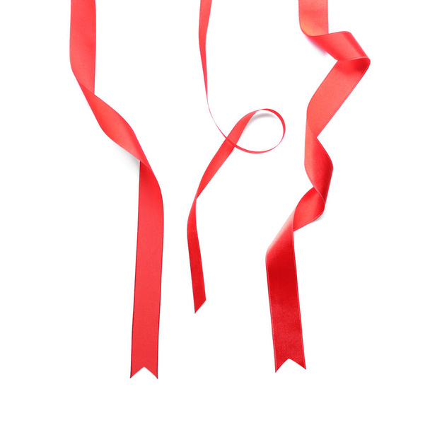 Red ribbons on white background - Photo, Image
