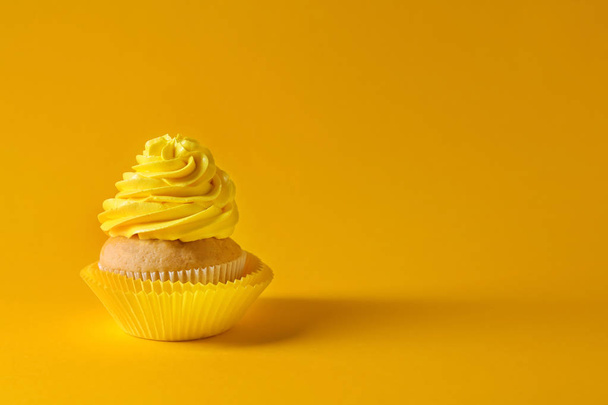 Delicious birthday cupcake on color background - Photo, Image