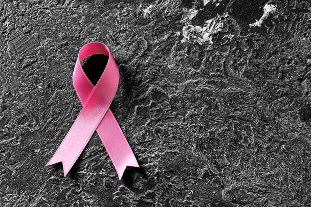 Pink ribbon on grunge background. Breast cancer awareness concept - Photo, Image