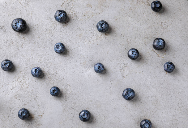 Ripe blueberries on light table - Fotoğraf, Görsel