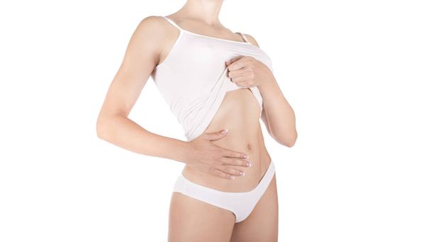 Cuerpo femenino en lencería blanca en él aislado en blanco. concepto de pérdida de grasa, liposucción y eliminación de celulitis
 - Foto, Imagen