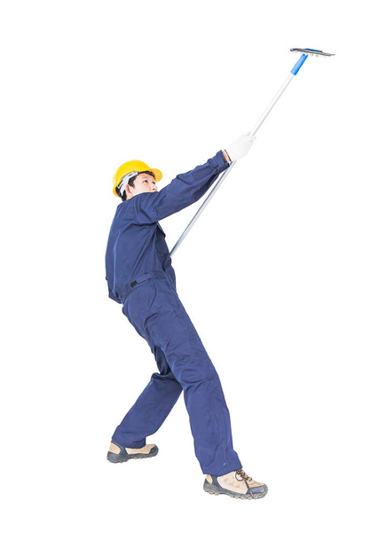 Young man in uniform hold mop for cleaning glass window, Cut out isolated on white background with clipping path - Φωτογραφία, εικόνα
