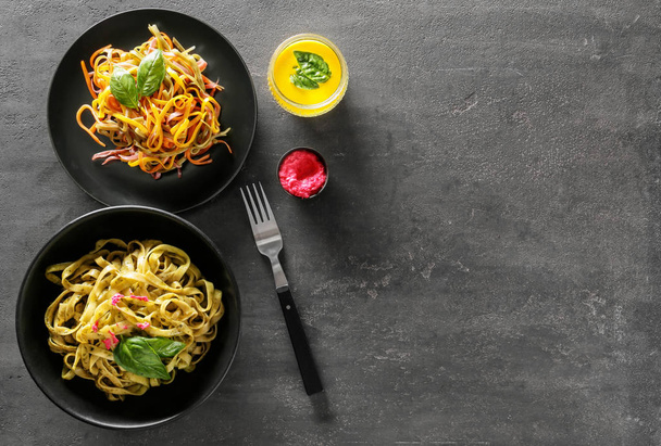 Plates with delicious pasta on table - Photo, Image