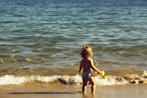 Small boy in sea water - Valokuva, kuva