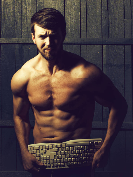 Man with keyboard - Fotó, kép