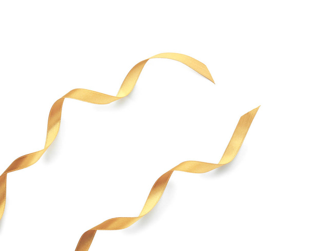 Beautiful golden ribbons on white background - Photo, Image