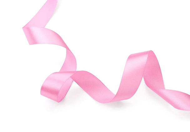 Curled pink ribbon on white background - Photo, Image