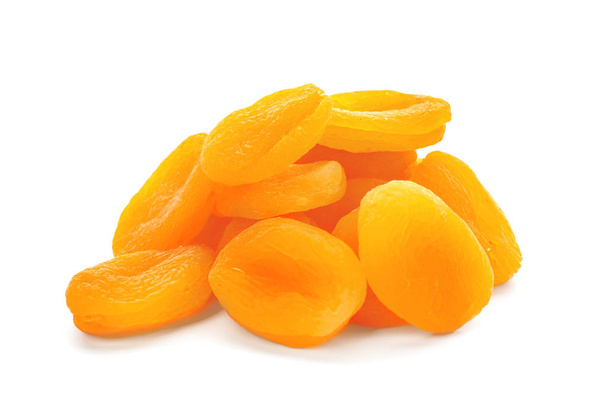 Pile of dried apricots on white background - Фото, зображення