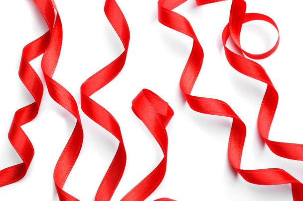 Curled red ribbons on white background - Photo, Image