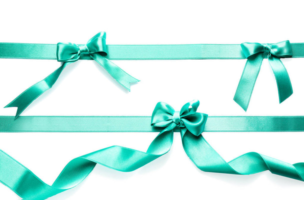 Color satin ribbons with bows on white background - Foto, Imagem