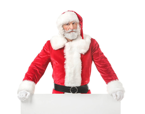 Portrait of Santa Claus with blank poster on white background - Foto, Imagem