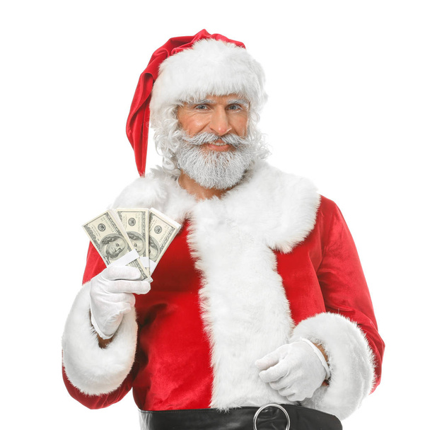 Joulupukki dollarin seteleitä valkoisella taustalla
 - Valokuva, kuva