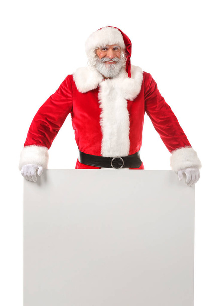 Portrait of Santa Claus with blank poster on white background - 写真・画像