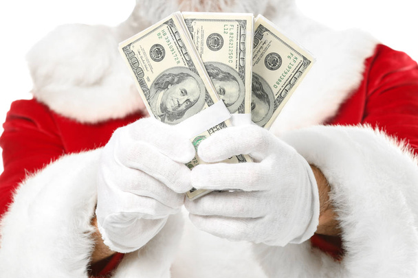 Santa Claus with dollar banknotes on white background, closeup - Fotoğraf, Görsel