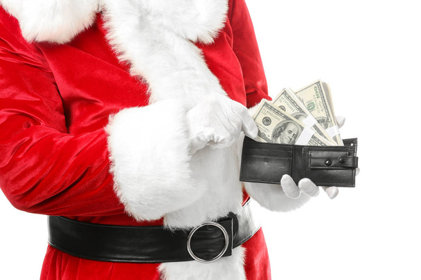Santa Claus with dollar banknotes on white background, closeup - Foto, imagen