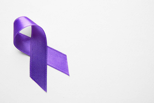 Purple ribbon on light background. Cancer concept - Foto, Imagem
