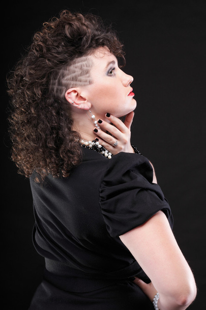 Ear super piercing woman curly girl - Foto, Imagen
