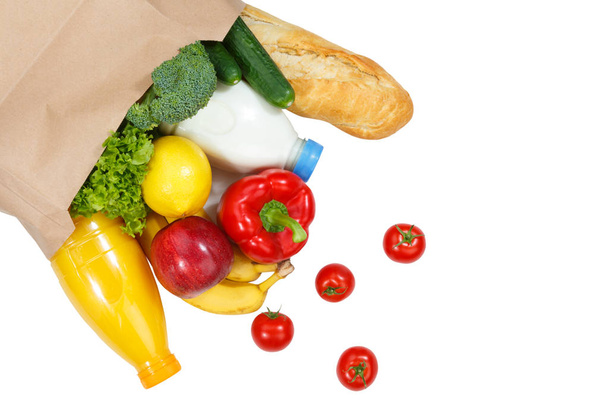 Купити їжу купує фрукти та овочі зверху паперовий мішок ізольовано на білому тлі
 - Фото, зображення