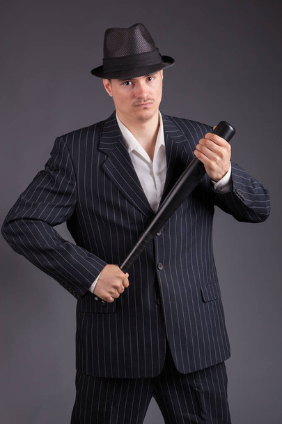 Bussinessman in suit with baseball bat - Φωτογραφία, εικόνα