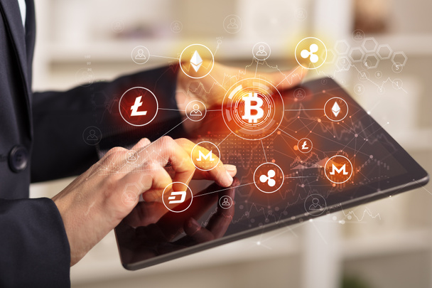 Business woman using tablet with bitcoin link network concept - Photo, Image