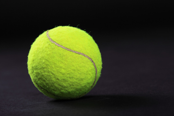 tennis balls on black background studio shot - Foto, Bild