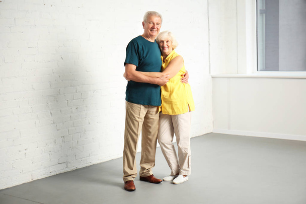 Happy mature couple in their new house - Fotoğraf, Görsel