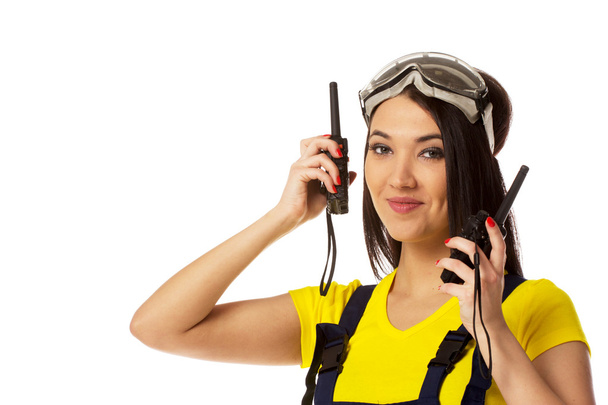 Woman with two cb radio, portrait, isolated on white - 写真・画像