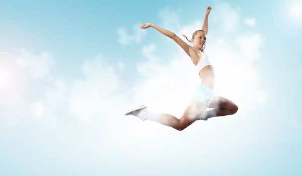 Image of sport woman jumping - Foto, Imagen