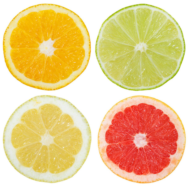 Collection of citrus fruits orange lemon slices sliced square isolated on a white background - Photo, image