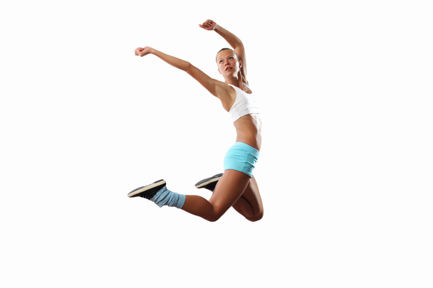 Image of sport woman jumping - Фото, зображення