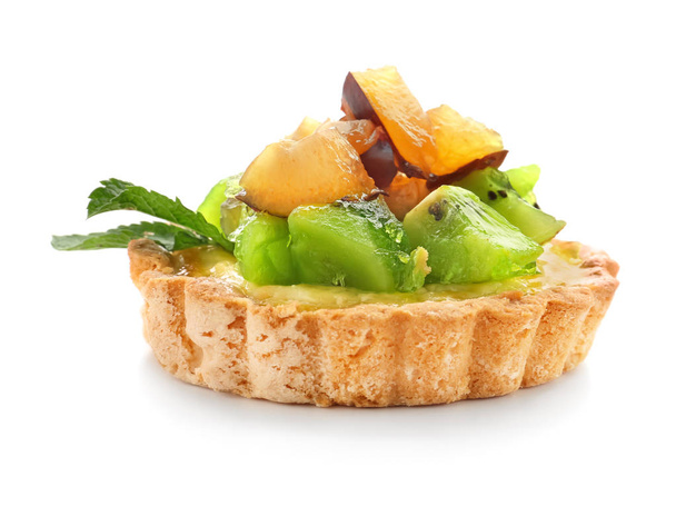 Delicious tart with fruits on white background - Foto, imagen