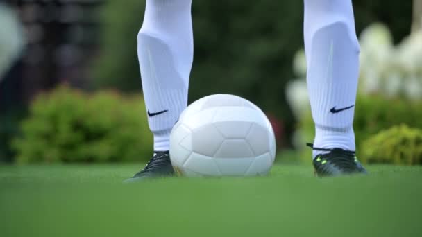August 20, 2018. Soccer Player Preparing For a Match. Soccer Ball and Lower Part of Legs Closeup. - Filmmaterial, Video