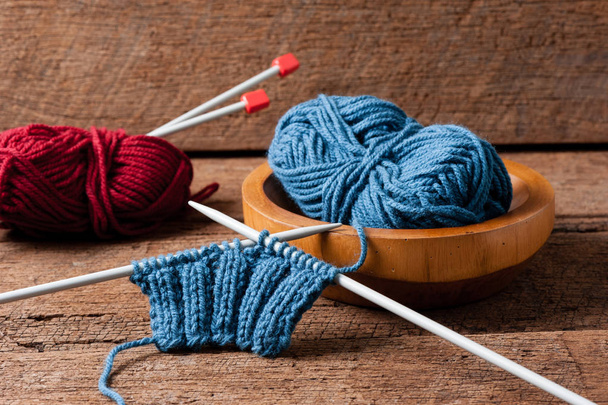 Blue knitting wool and knitting needles, knitting equipment - Photo, Image