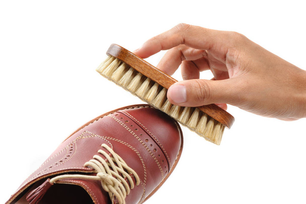 el cepillo de crin para el pulido del zapato de cuero
. - Foto, Imagen