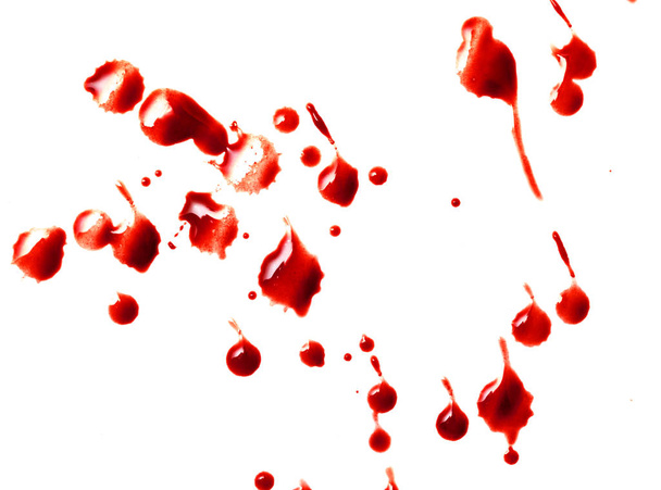 rode bloeddruppels op wit papier - Foto, afbeelding