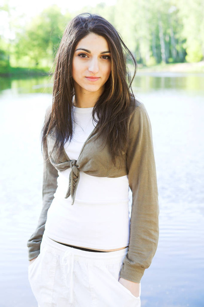 lovely girl girl  beside a lake - Zdjęcie, obraz