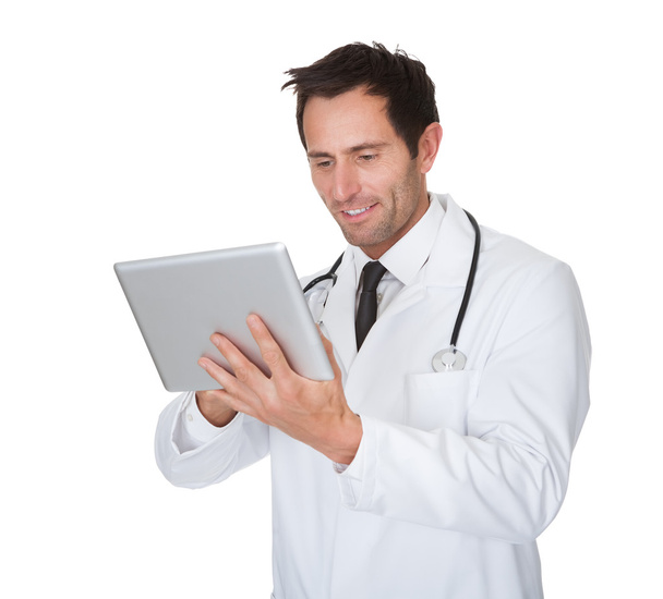 Portrait of friendly doctor with digital tablet - Foto, imagen
