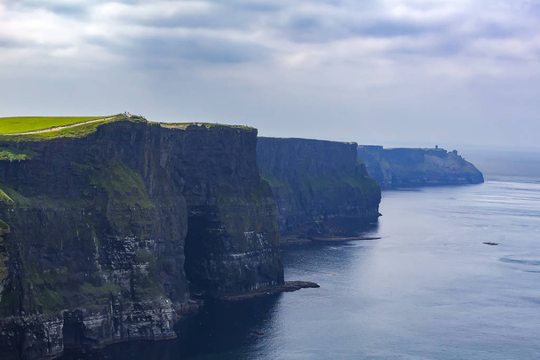 Cliffs of Moher in a misty day, Ireland - Photo, Image