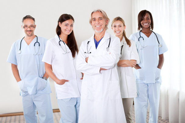 Portrait of group of friendly doctors - 写真・画像