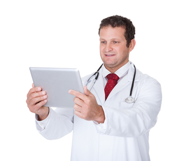 Confident doctor using tablet - Foto, Imagem
