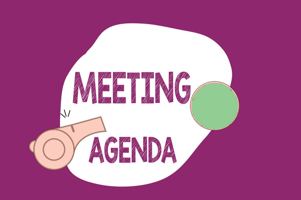 Escritura a mano del texto Agenda de la reunión. Concepto significado Una agenda establece expectativas claras para lo que necesita una reunión
 - Foto, imagen