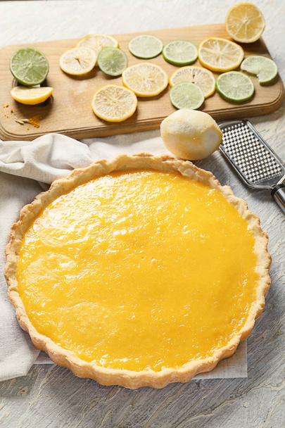 Tasty lemon pie on light wooden table - Photo, Image
