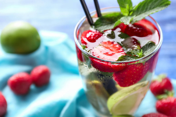Glass of fresh strawberry mojito on table - Photo, Image