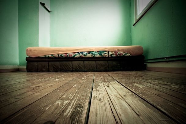 Mattress in green painted room - Photo, Image