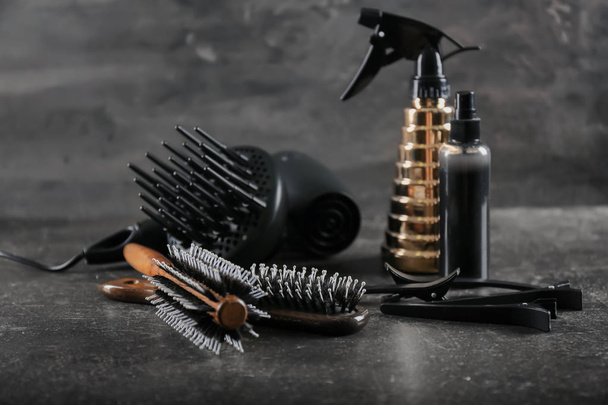 Professional hairdresser's set on dark background - Photo, Image