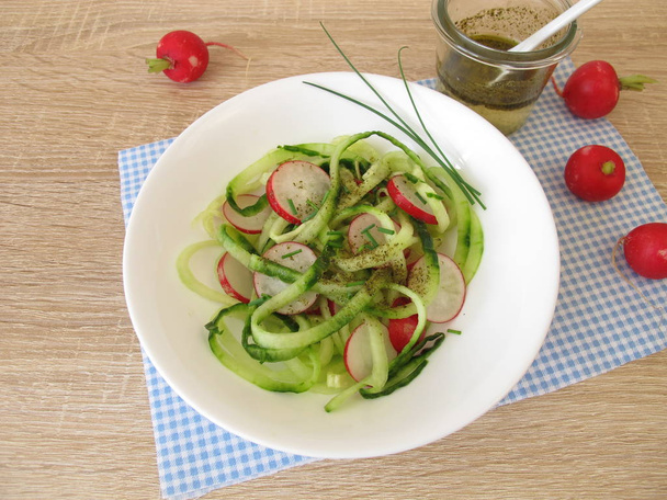 Spaghetti cucumber salad with vegetable noodles form spiralizers und red radish - Photo, Image