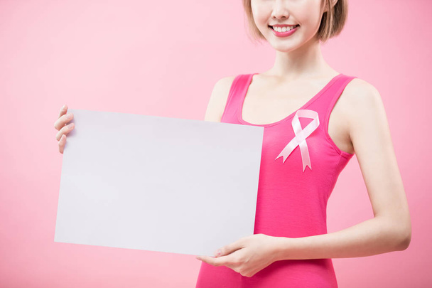 woman with white billboard. prevention breast cancer concept - Fotoğraf, Görsel